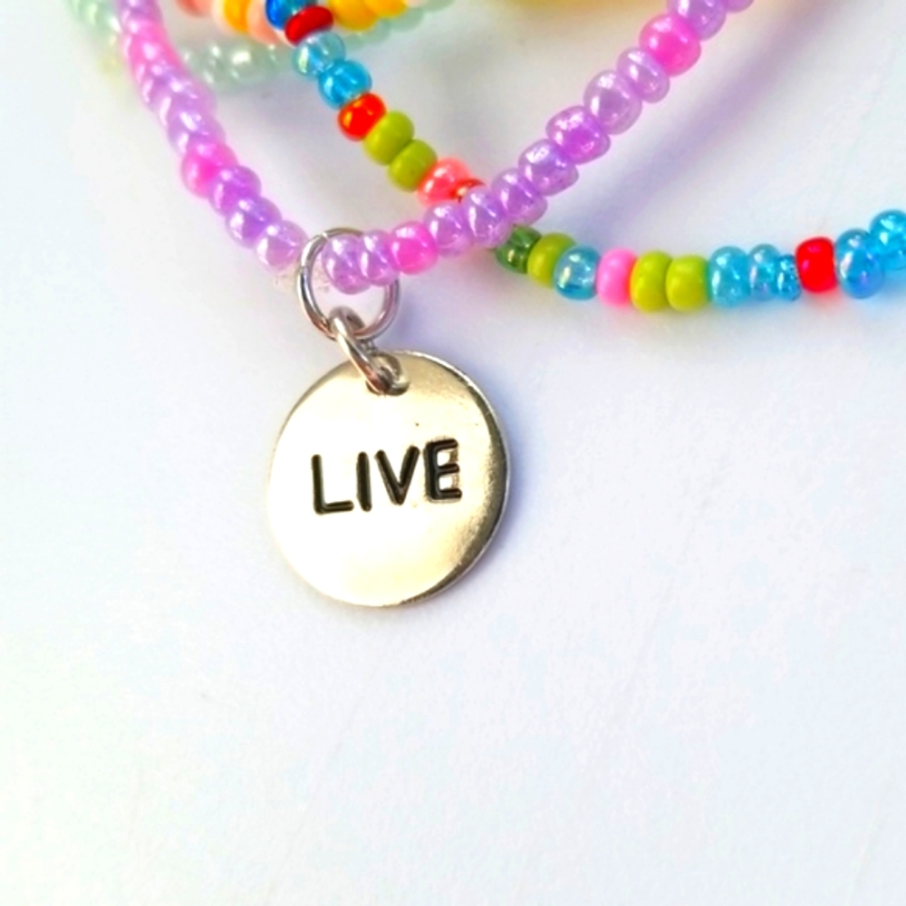 Live Charm Set of Pastel and Confetti Stretch Bracelets Jewelry. 7/09/107